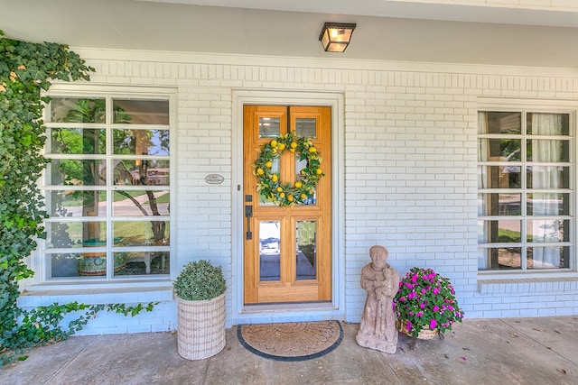 2121 Sul Ross St, San Angelo, TX 76904 - view of exterior entry with brick siding and covered porch