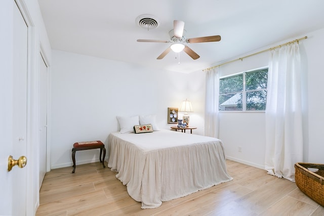 2121 Sul Ross St, San Angelo, TX 76904 - bedroom with light wood finished floors, a closet, and baseboards