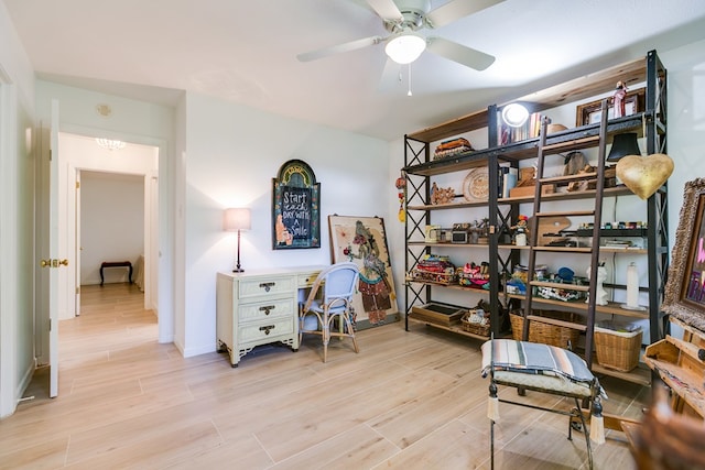 2121 Sul Ross St, San Angelo, TX 76904 - home office featuring a ceiling fan, light wood finished floors, and baseboards