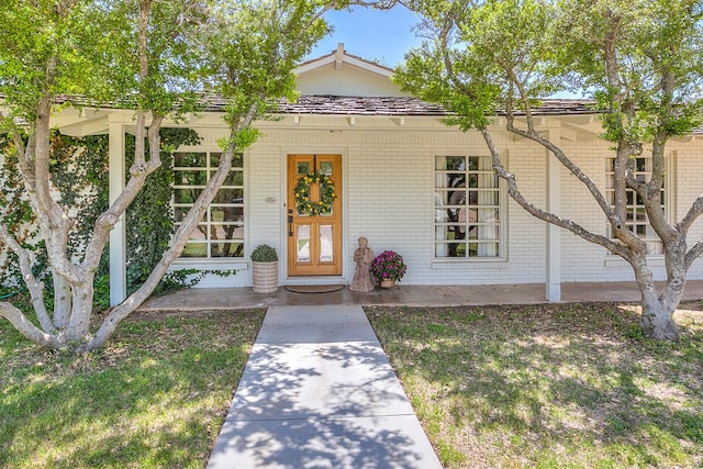 2121 Sul Ross St, San Angelo, TX 76904 - view of front of house featuring brick siding