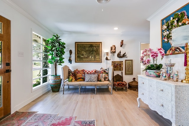 2121 Sul Ross St, San Angelo, TX 76904 - sitting room with light wood-type flooring, ornamental molding, baseboards, and recessed lighting