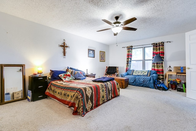 bedroom featuring a textured ceiling and ceiling fan