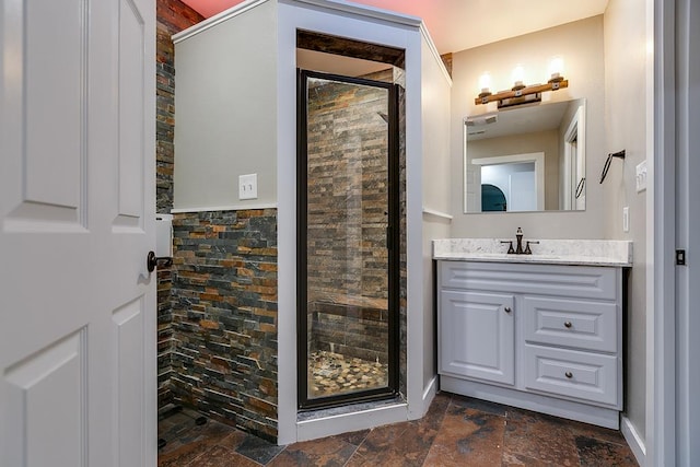 bathroom with vanity and walk in shower