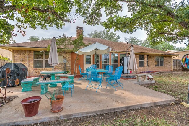 back of house featuring a patio area