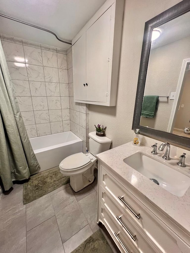 full bathroom featuring vanity, shower / bathtub combination with curtain, tile patterned floors, and toilet