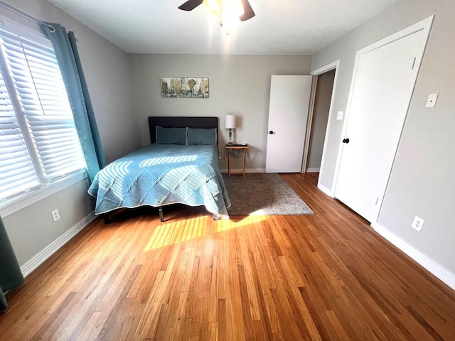 unfurnished bedroom with hardwood / wood-style floors and ceiling fan