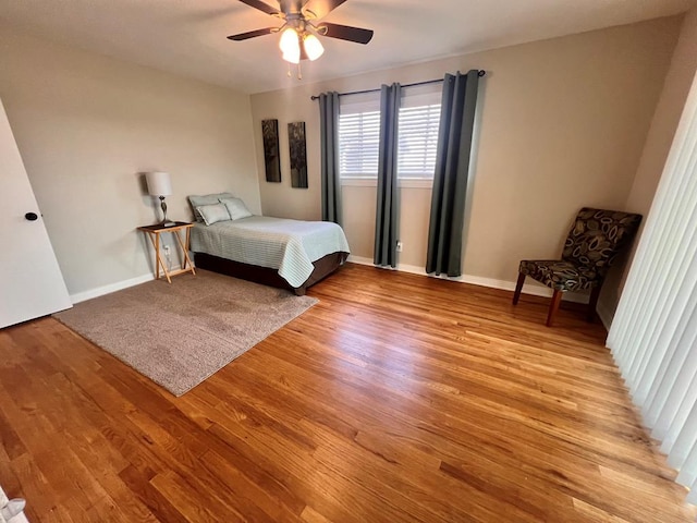 unfurnished bedroom with light hardwood / wood-style flooring and ceiling fan