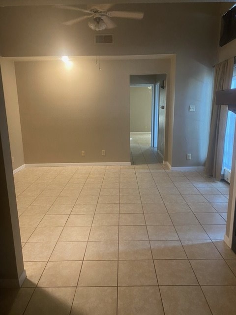 3603 Nevada Dr, San Angelo, TX 76904 - spare room with ceiling fan and light tile patterned floors