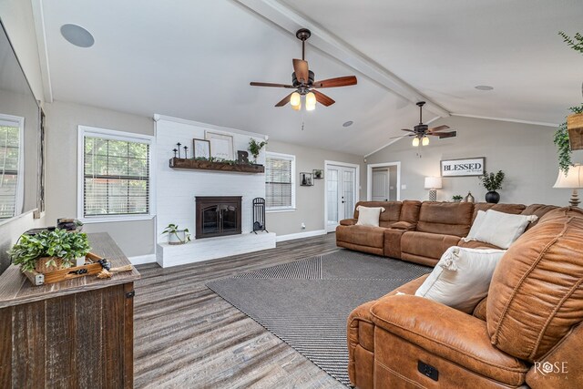 3513 Lindenwood Dr, San Angelo, TX 76904 - living room with ceiling fan, wood finished floors, and a fireplace