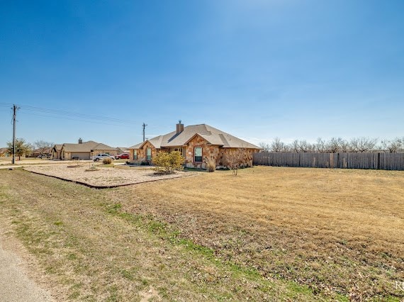 view of yard with fence