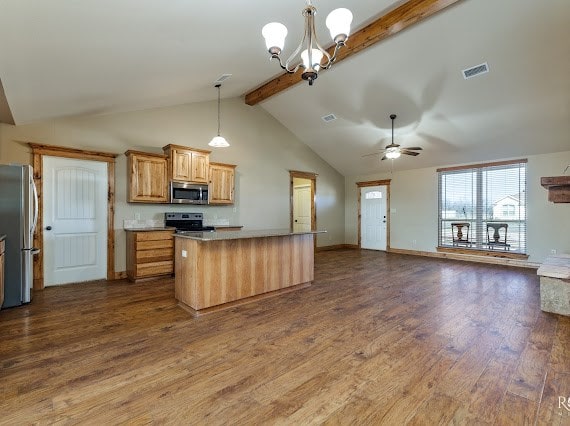 kitchen with stainless steel appliances, dark wood-style flooring, visible vents, open floor plan, and beamed ceiling