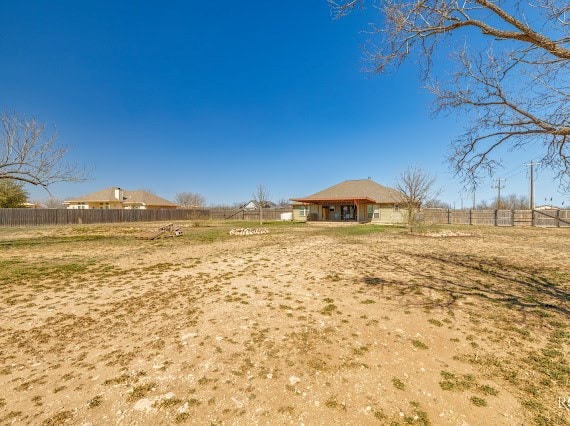 view of yard with fence