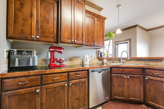 kitchen with ornamental molding, a sink, tile countertops, and stainless steel dishwasher