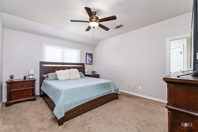 bedroom featuring lofted ceiling, carpet, visible vents, and baseboards