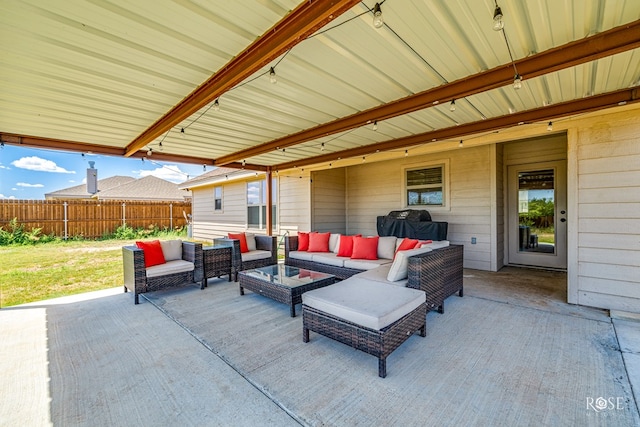 view of patio / terrace with outdoor lounge area and fence