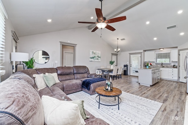 living area featuring light wood finished floors, visible vents, ceiling fan, beam ceiling, and recessed lighting