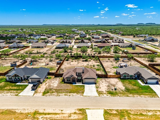 birds eye view of property with a residential view and a mountain view