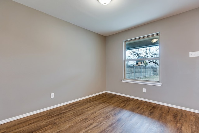 empty room featuring hardwood / wood-style flooring