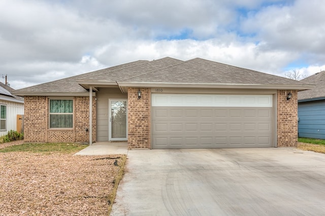 single story home with a garage