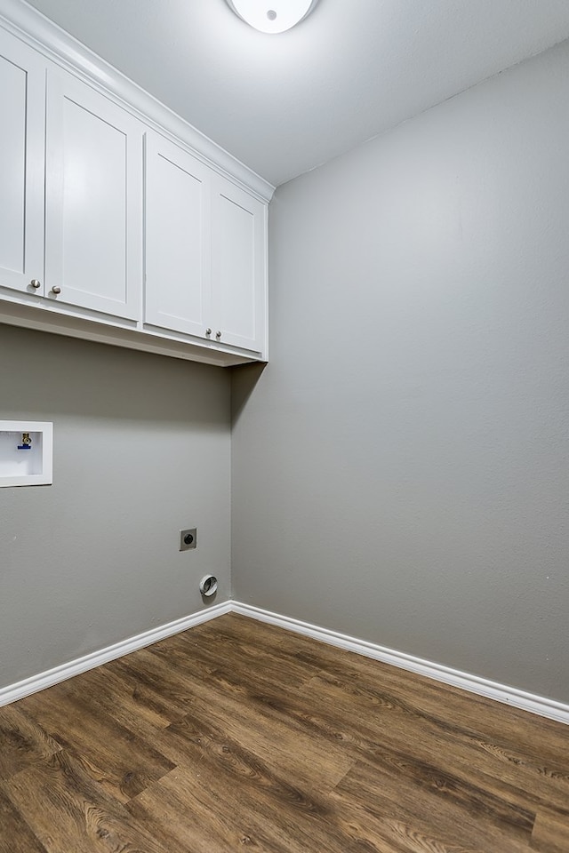 laundry area with washer hookup, cabinets, hookup for an electric dryer, and dark hardwood / wood-style floors