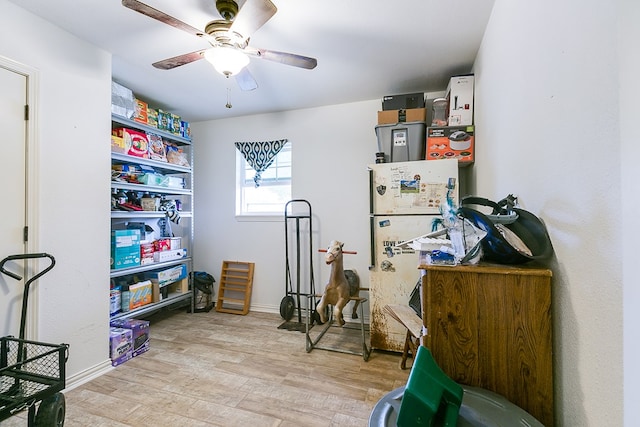 storage area featuring ceiling fan