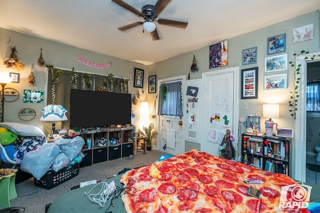 bedroom featuring ensuite bath, ceiling fan, and carpet flooring