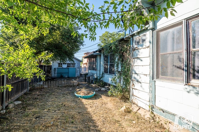 view of yard with central air condition unit