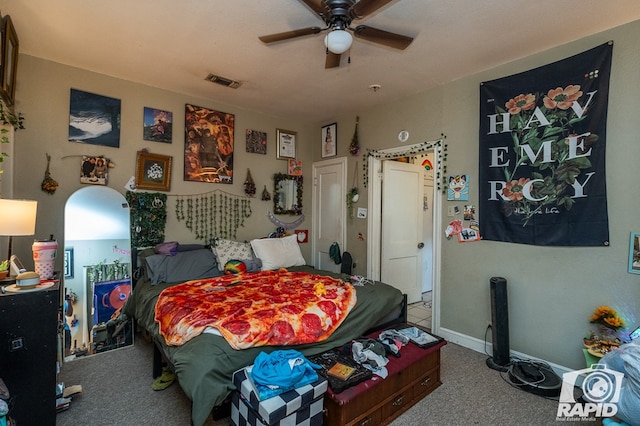 bedroom featuring ceiling fan and carpet flooring