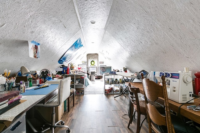 office with dark wood-type flooring and vaulted ceiling