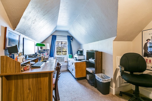 office space with light carpet, cooling unit, vaulted ceiling, and a textured ceiling