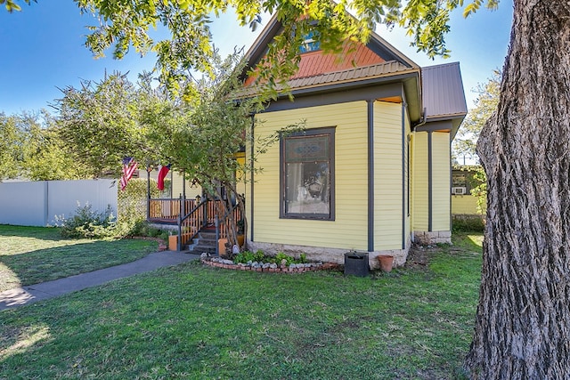 exterior space with a front lawn