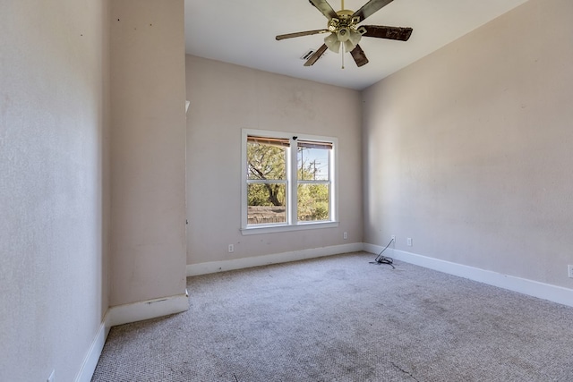 unfurnished room featuring light colored carpet and ceiling fan