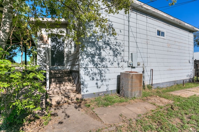 view of property exterior featuring central AC unit