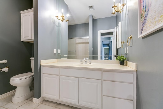 1001 Avondale Ave, San Angelo, TX 76901 - full bathroom featuring tile patterned floors, vanity, baseboards, toilet, and a shower
