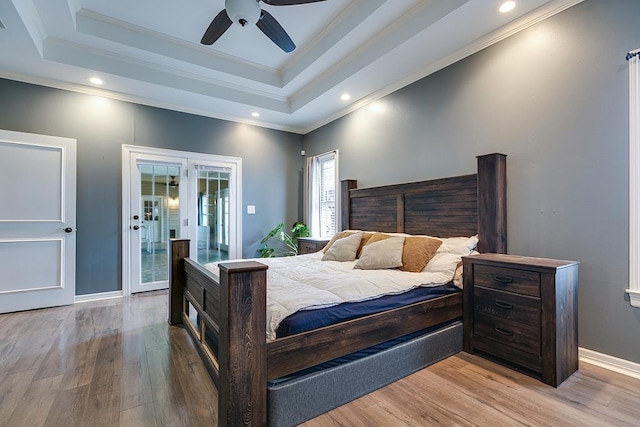 1001 Avondale Ave, San Angelo, TX 76901 - bedroom featuring light wood-style floors, french doors, ornamental molding, baseboards, and access to outside