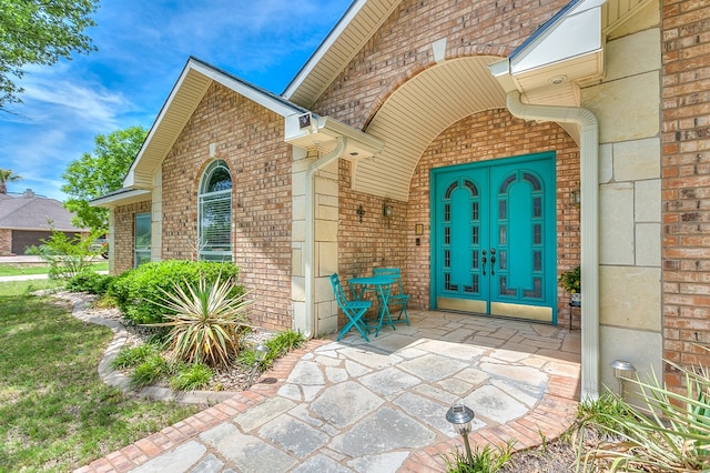 1001 Avondale Ave, San Angelo, TX 76901 - doorway to property with brick siding