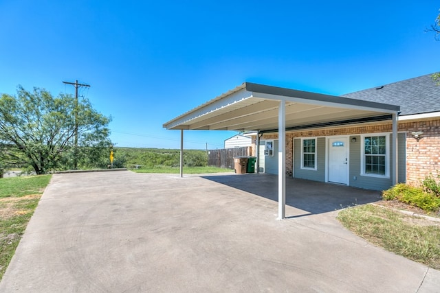 1001 Avondale Ave, San Angelo, TX 76901 - view of patio with driveway and a carport