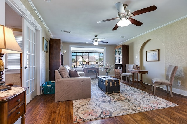 living room featuring crown molding and dark hardwood / wood-style floors