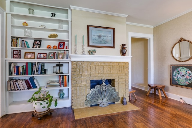 living room featuring crown molding, a brick fireplace, and dark wood-type flooring