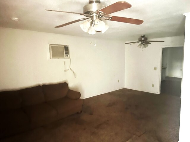 unfurnished living room with a wall mounted air conditioner and ceiling fan