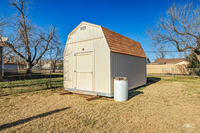 view of shed with fence