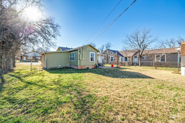 view of yard with a residential view and a fenced backyard