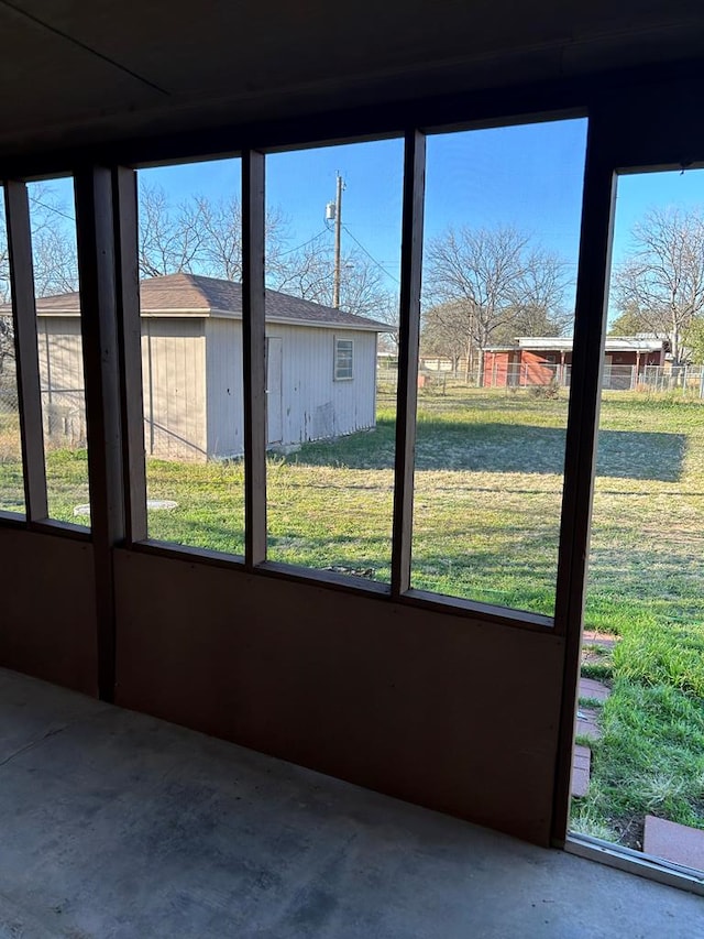 unfurnished sunroom with plenty of natural light