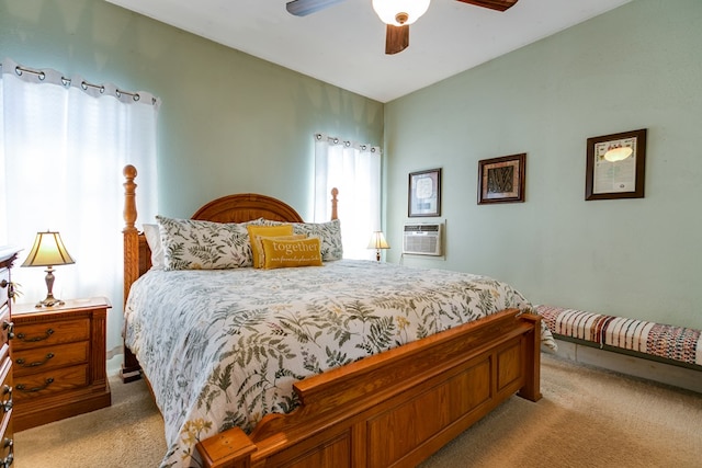 bedroom featuring light carpet, a wall mounted AC, and ceiling fan