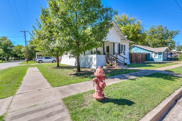 view of front of home with a front yard