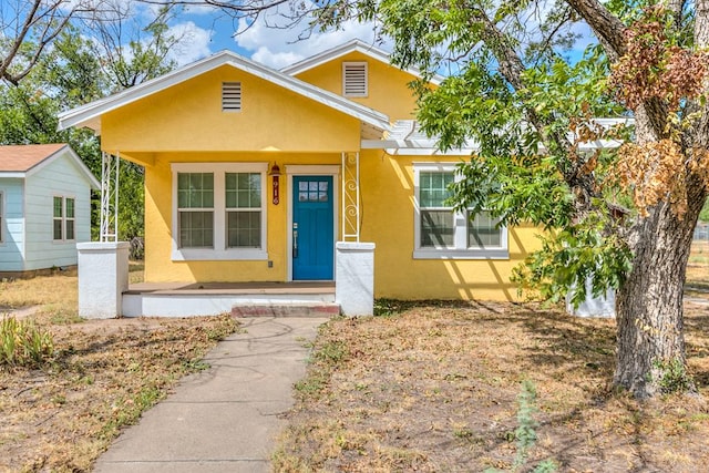 bungalow-style home featuring a porch