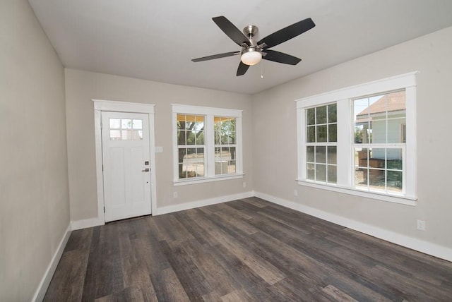 entryway with ceiling fan and dark hardwood / wood-style floors