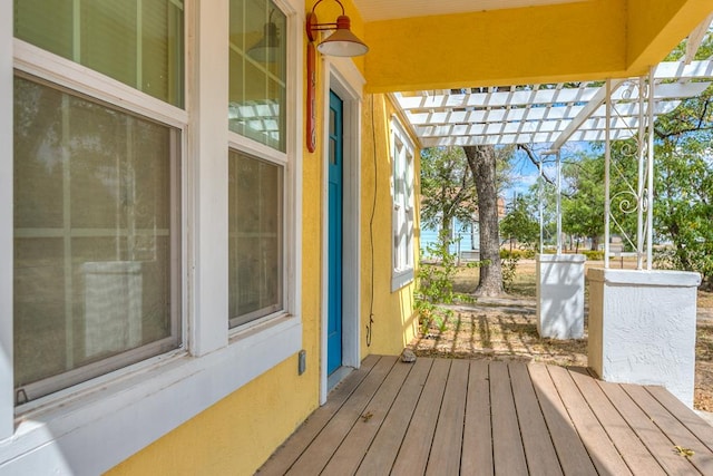 exterior space with a pergola and a deck