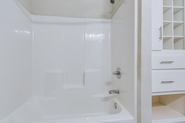 bathroom featuring shower / washtub combination