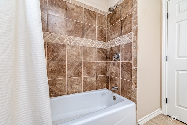 7738 Bison Trl, San Angelo, TX 76901 - full bath featuring shower / tub combo with curtain and baseboards